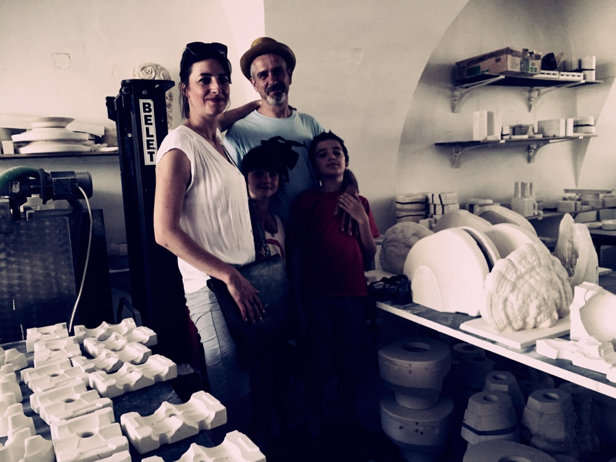 Daniel and Tereza Pirsc with their kids in his porcelain workshop image: Curious Egg